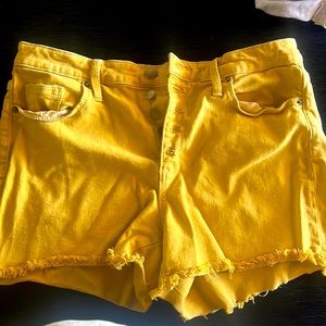 Mustard Yellow denim shorts, Size 12/21 which is a Large.